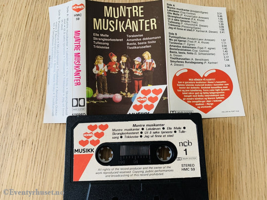 Muntre Musikanter (Homes). Kassett. Kassett (Mc)