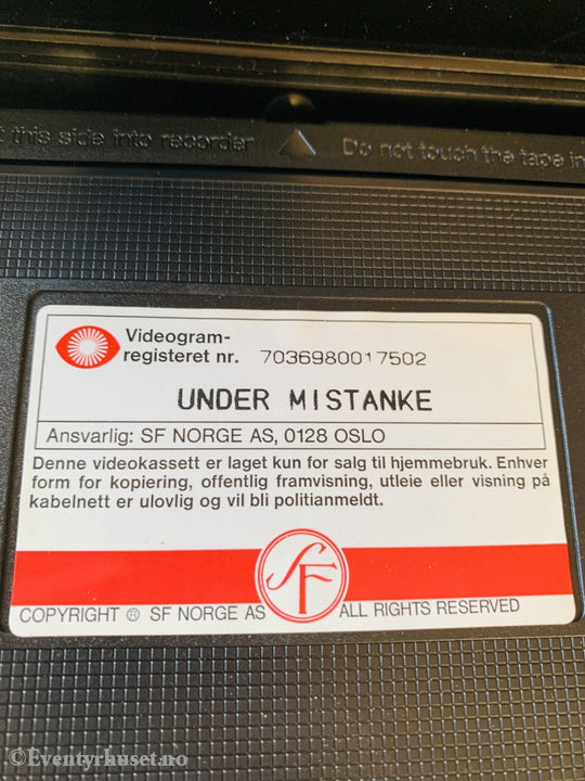 Under Mistanke. 1991. Vhs.